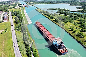 Aerial of a Lake Freighter sailing in the Welland Canal, Canada