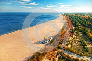 Aerial landscape of the beautiful beach with lifeguards house at Baltic Sea in Gdansk, Poland