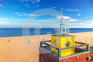 Aerial landscape of the beautiful beach with lifeguards house at Baltic Sea in Gdansk, Poland