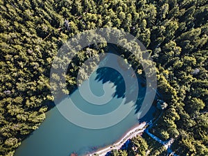 Aerial landscape of beautiful mountain lake in the forest photo