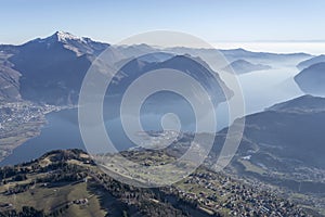 Aerial landscape of Castro lakeside village and Sebino lake from north,  Orobie, Italy photo
