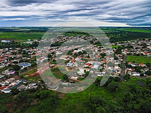 Aerial landscape of city scape with park during summer in Tangara da Serra in Mato Grosso