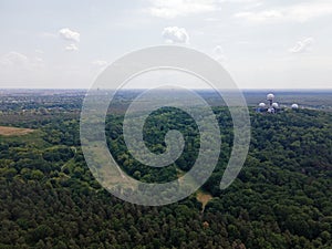 Aerial landscape of Drachenberg trash mountain in Grunewald forest and Teufelsberg in Berlin