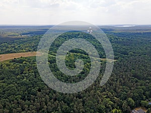 Aerial landscape of Drachenberg trash mountain in Grunewald forest and Teufelsberg in Berlin