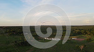 Aerial landscape of farmland in the countryside at sunset in Mato Grosso