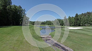 Aerial landscape flight over golf course