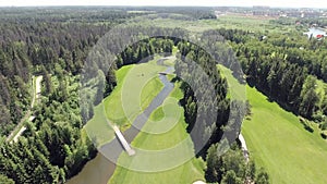 Aerial landscape flight over golf course