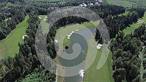 Aerial landscape flight over golf course