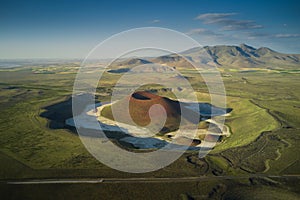 Aerial landscape of Meke Crater in Turkey. Stunned view of green valley with mountains and crater lake