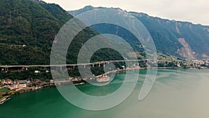 Aerial Landscape with Mountain Road, Alpine Town and Geneva Lake in Switzerland