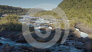 Aerial landscape of Osorno Volcano and Falls of Petrohue, Pack shot with a Red 4x4 - Puerto Varas, Chile, South America.