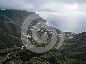 Aerial landscape photo of a beautiful coastal town between mountains at sunset. Taganana, Tenerife