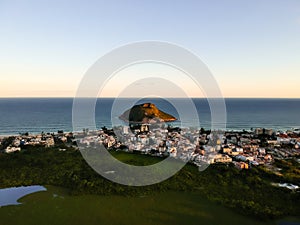 Aerial landscape photo of Recreio dos Bandeirantes beach during sunset, with views of Chico Mendes park and the Pontal