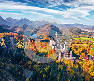 Aerial landscape photography. View from flying drone popular tourist destination - Neuschwanstein Castle