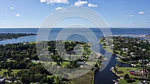 Aerial landscape shot over Bay Shore, Long Island, New York, the US on a sunny day