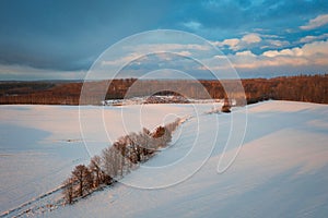 Aerial landscape of the snowy field at winter, Poland