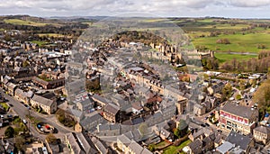 Aerial landscape view of Alnwick Castle and town centre in Northumberland, UK