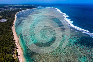 Aerial landscape view of the area around Riambel Public Beach located on Mauritius Islands South Coast with a massive reef