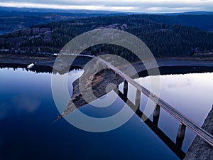 Aerial landscape view of bridge over reservoir, Harz mountains in Lower Saxony, Germany.