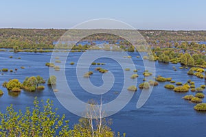 Aerial landscape view on Desna river with flooded meadows and fields. View from high bank on annual spring overflow