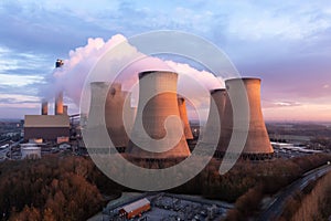 Aerial landscape view of Drax Power Station with pollution emissions at sunset