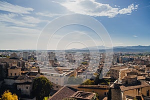 Aerial landscape view of Girona, a city in Spain northeastern Catalonia region, beside the River Onyar, on a sunny day