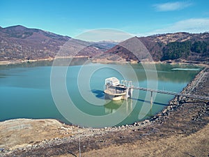 Aerial landscape view of lake Maneciu in early spring