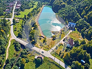 Aerial landscape view of a mountain village and a lake