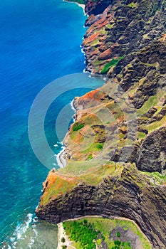 Aerial landscape view of spectacular Na Pali coastline from helicopter, Kauai