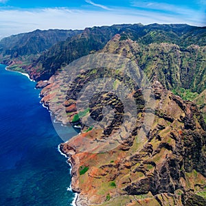 Aerial landscape view of spectacular Na Pali coastline from helicopter, Kauai