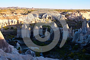 Aerial landscape view of typical geologic formations of Cappadocia. Amazing shaped sandstone rocks. Famous touristic place