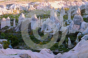 Aerial landscape view of typical geologic formations of Cappadocia. Amazing shaped sandstone rocks. Famous touristic place