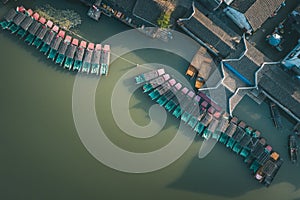 Aerial landscapes of Jinxi village, row of traditional wooden boat, a historic canal town in southwest Kunshan, Jiangsu Province,