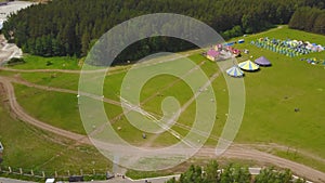 Aerial Large group of beautiful kids boys and girls running with kids in the park. Kite Carefree Activity Summer Joyful