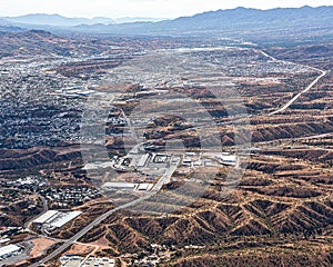 Aerial look at the Border Crossing at Nogales, United States in the foreground and Mexico in the distance photo