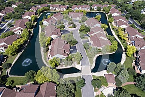 Aerial Luxury Townhouse Complex with Pond