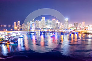 Aerial Miami skyline night long exposure in Miami Beach and MacArthur Causeway