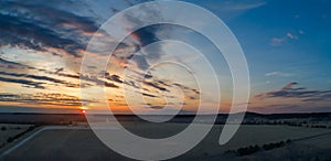 Aerial midwest rural farm land sunset