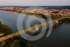 Aerial of Modern Truss Bridge with City Skyline in Background - Ohio River - Huntington, West Virginia & Ohio