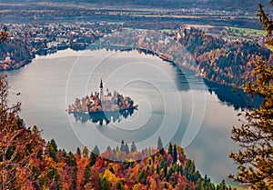 Aerial morning scene of church of Assumption of Maria. Scenic autumn view of Bled lake.