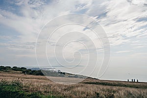 Aerial morning summer view over Eastbourne seafront and pier from Beachy Head