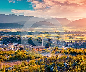 Aerial morning view of outskirts of Saranda town.