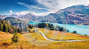 Aerial morning view of Roselend lake/Lac de Roselend. Picturesque autumn scene of Auvergne-Rhone-Alpes, France, Europe. Beauty of