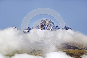 Aerial of Mount Kenya, Africa with snow and white puffy clouds in January, the second highest mountain at 17,058 feet or 5199 Mete
