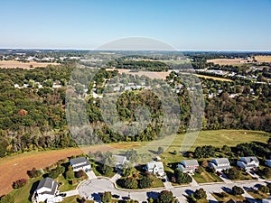 Aerial of New Freedom and surrounding Farmland in Southern Pennsylvania during Fall