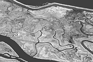 aerial of Newark marshland at the coast with canal and saltern fields to stabilize ground, Newark, San Francisco