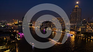 Aerial night scene of chaopraya river in heart of bangkok