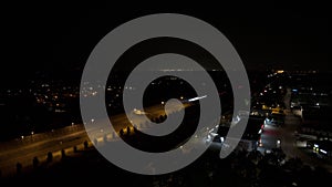 Aerial Night time lapse dutch highway with cars and truck traffic light trails