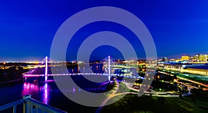 Aerial night view of Bob Kerrey Pedestrian bridge across Missouri River in Omaha Nebraska.