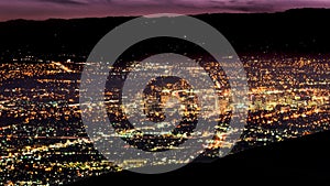 Aerial night view of the brightly illuminated downtown area of San Jose, Silicon Valley, California